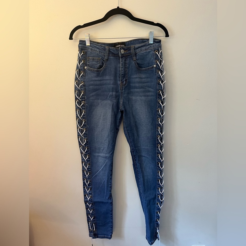 Blue Fashion Nova skinny jeans with white laces up the sides